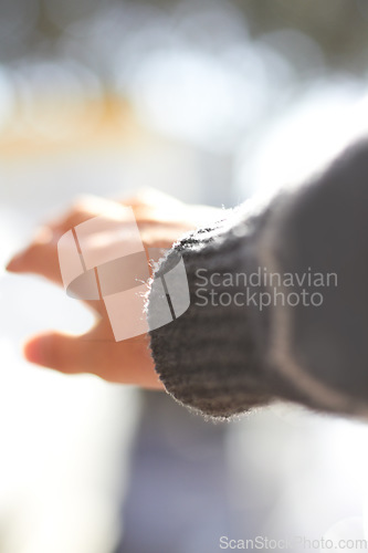 Image of Closeup, hand and reaching out for help with mental health, support or healing. Nature, hope and a person with a gesture for trust, lost or stretching for assistance with anxiety or depression