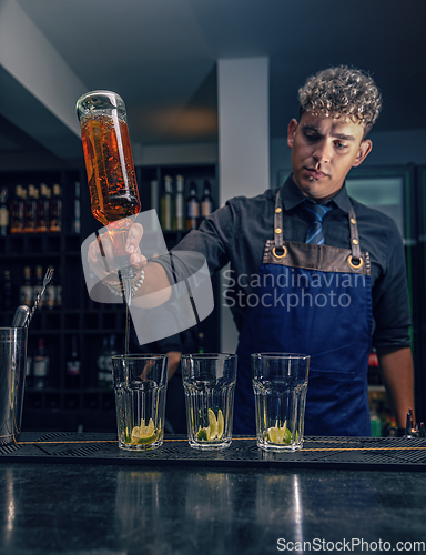 Image of Bartender making cocktail