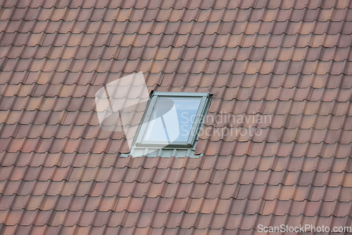 Image of Roof window on metal roof
