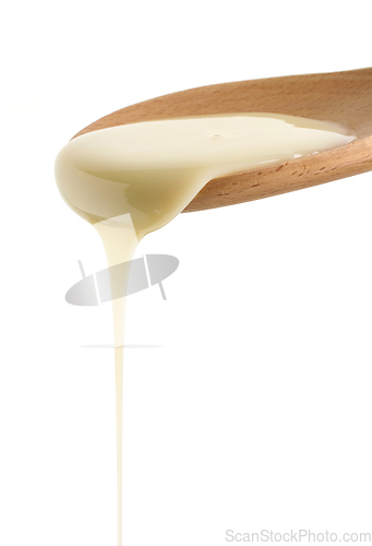 Image of pouring condensed milk