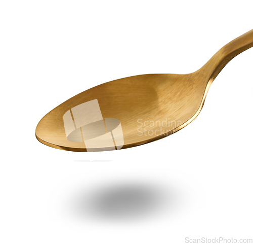 Image of empty golden spoon