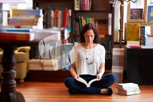 Image of Woman, reading and floor in bookshop, library or relax for thinking for knowledge, information or literature. Girl, books and ideas for learning, education or studying on steps with research in store