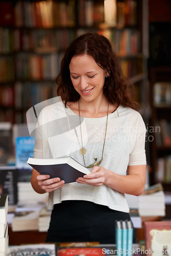 Image of Woman, bookshop and reading with sale, shopping and thinking for decision, smile and learning with ideas. Girl, novel or literature in store, library and college with deal, discount for knowledge