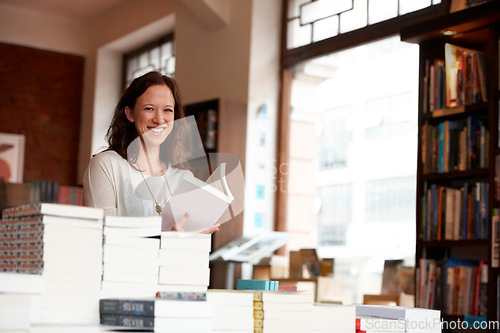 Image of Woman, reading and happy in bookshop, portrait and relax on stairs with knowledge, information and literature. Girl, book and smile for learning, education or studying on steps with research in store