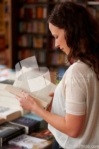 Image of Woman, bookstore and reading with shopping, research and thinking in profile, learning and ideas. Girl, novel or literature in store, library or choice for deal, discount or retail sale with search