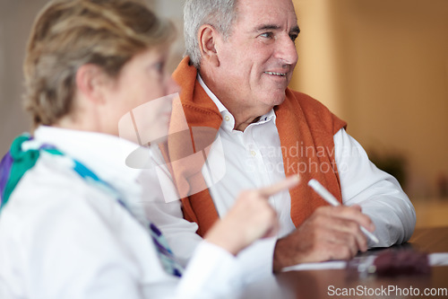 Image of Sign, hotel and senior couple by reception to check in desk for travel, anniversary and relax. Retirement, hospitality resort and elderly man and woman with concierge for bonding, holiday or vacation
