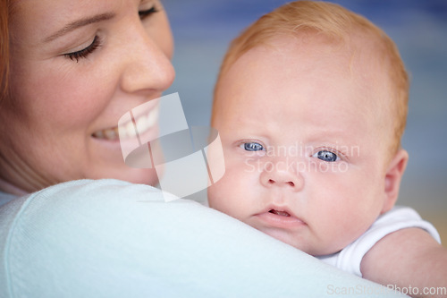 Image of Baby, relax and portrait of newborn with mother in home holding infant and bonding together with a smile. Child, happiness and mom carrying boy in arms with love, care and support of mommy in house