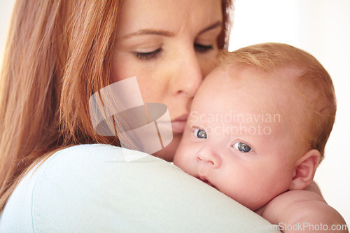 Image of Kiss, baby and portrait with mother holding newborn in home for bonding together. Infant, face and mom carrying infant child in arms to relax in house with love, care and support with mommy