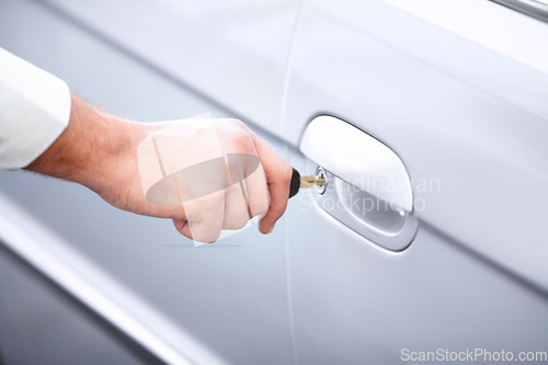 Image of Closeup, hand and keys to a car for opening a door, travel or transportation. Zoom, salesman and a person at transport, vehicle or a rental for. commute, trip or journey in the morning in town
