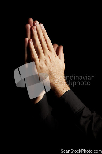Image of Prayer, hands and black background for hope, religion and faith or ask for help with worship or spiritual support in studio. Praying emoji, christian person and God, forgive or humanity in dark room