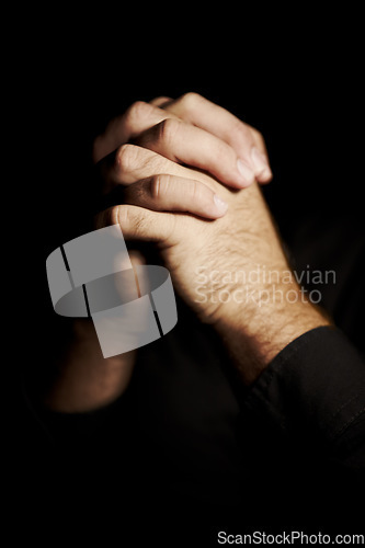 Image of Praying, hands and black background for faith, hope and religion or asking for help with mental health or support in studio. Prayer emoji, christian person and sorry, forgive or humanity in dark room