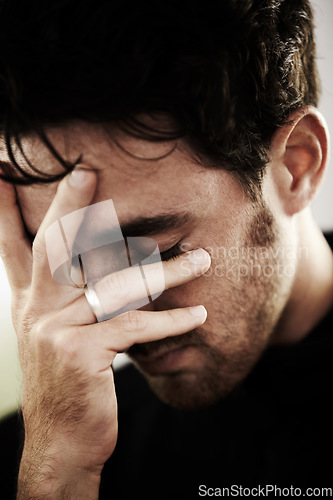 Image of Man, sad or depressed with mental health and pain, stress or burnout with financial or life crisis, distress and upset. Emotion, hand covering face and trauma, bankruptcy or debt with depression