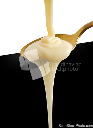 Image of spoon of condensed milk