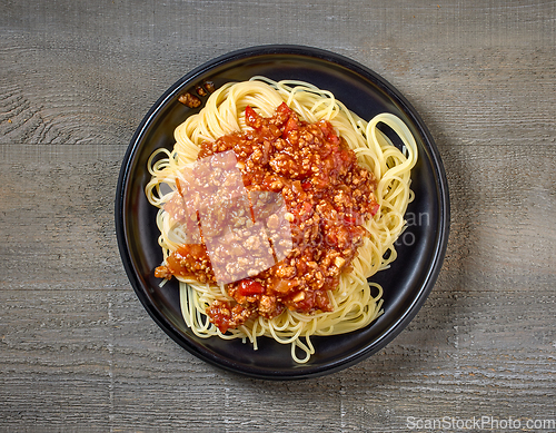 Image of plate of pasta spaghetti with sauce bolognese