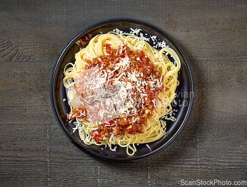 Image of plate of pasta spaghetti with sauce bolognese