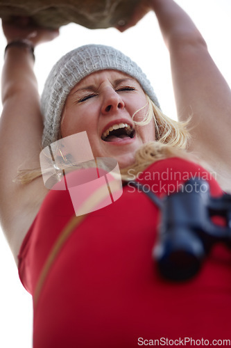 Image of Woman, screaming and rock climbing fall or risk, mistake and scared of death, danger and fear. Female person, shouting and terrified of falling, outside and holding on cliff, terror and anxiety
