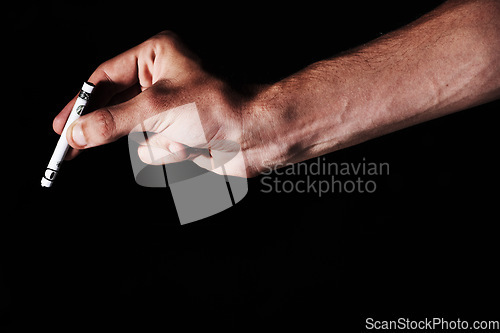 Image of Hand, money roll and drugs, person on black background with addiction and cocaine, sniff and mockup space. Abuse, mental health and junkie, rolled cash for crack with crime or illegal in studio