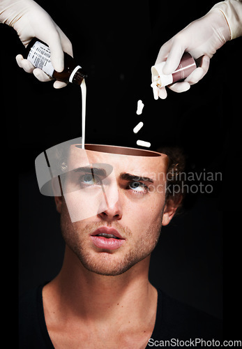 Image of Hands pour medicine in head of man, mental health and treatment in studio isolated on a black background. Pills, sick person and antidepressant drugs or medication for depression, anxiety and stress