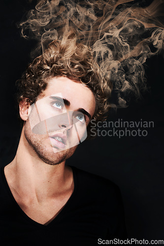 Image of Intoxicated, high and man smoke drugs in studio isolated on dark background. Hallucination, addiction and person smoking, substance abuse and narcotics vapor in hair, fantasy and sick with depression