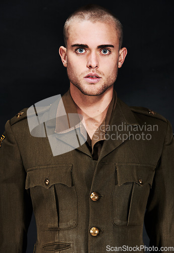Image of Military, portrait or man with ptsd, serious or surprised face and fear, terror and anxiety in studio. Man, guy or wide eyes with addiction, user or psychosis for insomnia on black background or risk