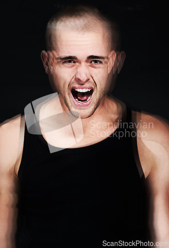 Image of Stress, blur and portrait of screaming man in studio isolated on a black background. Anger, anxiety and face of person shouting for mental health crisis, psychology or crazy, frustrated or depression