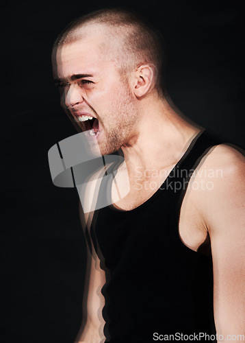 Image of Frustrated, stress and blur of man shouting in studio isolated on a black background. Anger, anxiety and person screaming for mental health crisis, psychology or crazy trauma, depression or bipolar