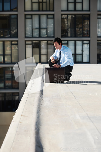 Image of Businessman, suicide or roof and thinking, depression and mental health with suitcase outdoor in city. Professional, person or employee and stress on rooftop of building with anxiety, risk and crisis