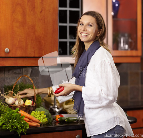 Image of Woman, portrait and unpacking vegetables kitchen for nutrition meal, healthy green salad or vegan choice. Female person, smile and basket grocery for eating broccoli dinner, diet or organic vitamin