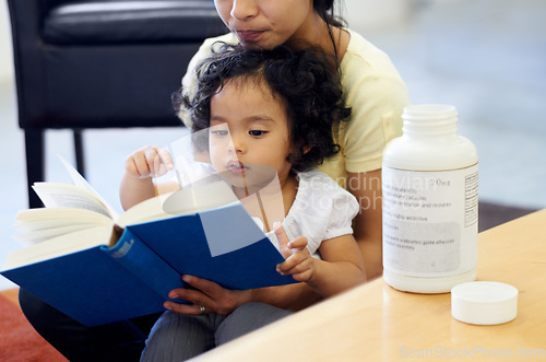 Image of Mother, child and reading or book concentration pill bottle.adhd diagnosis, learning or development. Daughter, woman or childhood story knowledge discipline, medical pills capsules or school problem