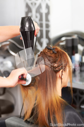 Image of Hair care, woman in salon with stylist and dryer for beauty, luxury hairstyle and professional service. Haircare, brush and girl at hairdresser with tools for shampoo, color and style at wellness spa