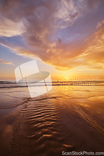 Image of Atlantic ocean sunset with surging waves at Fonte da Telha beach, Portugal