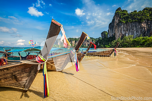 Image of Long tail boats on beach, Thailand