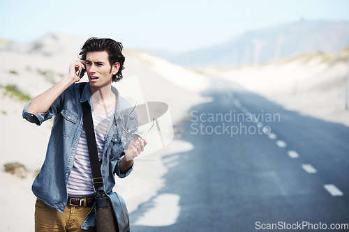 Image of Man, lost and phone call by road for location, phone taxi and search or transport with doubt. Person, travel and communication with technology for destination guide, street in atlantis with cellphone