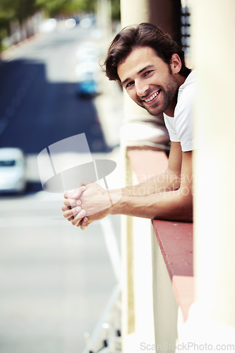 Image of Hotel room, window and portrait of happy man on vacation with freedom, smile or positive attitude. Face, smile and male traveler relax in Italy for holiday, adventure or enjoy local accommodation