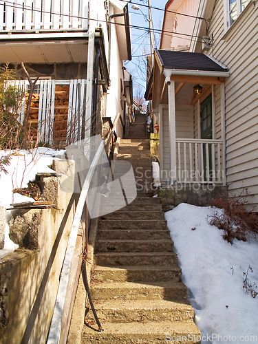 Image of Norway house, staircase and nature with snow by porch in winter, ice or natural vacation location. Europe, travel and destination for adventure, ice weather and sustainable building for conservation