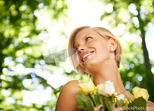 Image of Relax, nature and happy woman in garden with flowers for holiday in spring on outdoor picnic. Smile, freedom and face of girl in park with trees for weekend in countryside with sunshine on vacation.