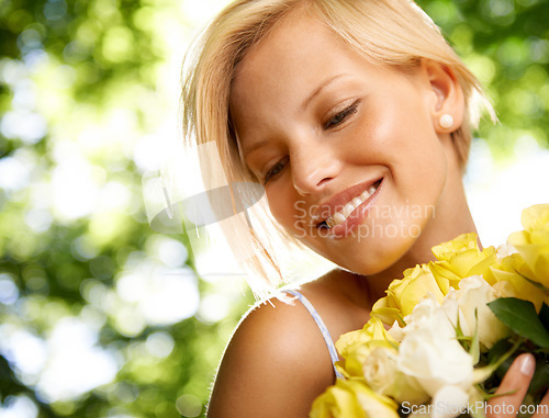 Image of Smile, nature and woman in garden with flower bouquet for holiday in spring on outdoor picnic. Roses, freedom and happiness, girl in park for weekend in floral countryside with sunshine on vacation.