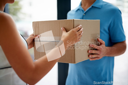 Image of Front door, delivery guy or hands of customer with boxes for ecommerce distribution or online shopping. Shipping services, closeup or courier man giving cardboard parcel, product or package in home