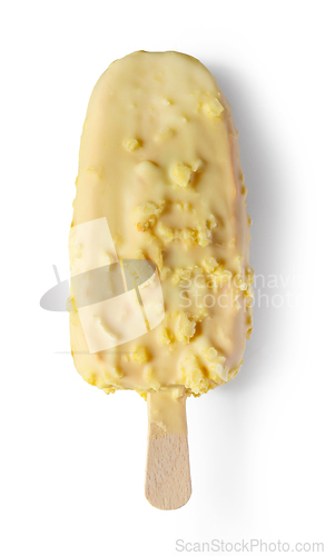 Image of orange ice cream covered with white chocolate