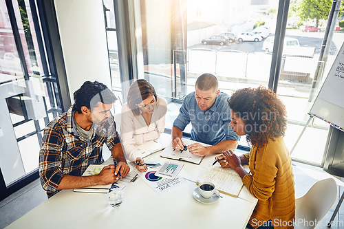 Image of Team, review and meeting with graphs and stats of company target, goals or market research with data analysis. Above, table or paperwork report of growth, progress or startup performance analytics