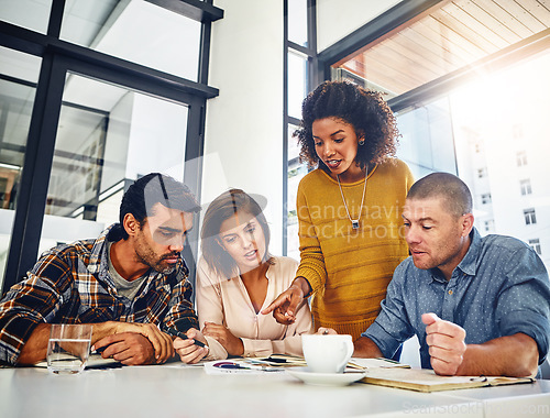 Image of Teamwork, review and meeting with market research, data talking with documents or analysis of kpi information. Stats, report and people discuss analytics in planning a marketing strategy or project