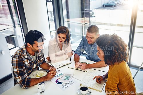 Image of Office, meeting and paperwork with stats, data and analysis of report with market research for kpi and goals. Analytics, graphs and above people at desk in workplace with online marketing strategy