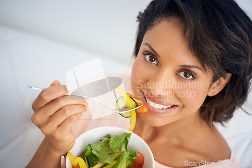Image of Eating, salad and portrait of happy woman with lunch, nutrition and wellness in diet. Healthy food, fruit and vegetables in bowl for meal on sofa in home living room with happiness and a smile