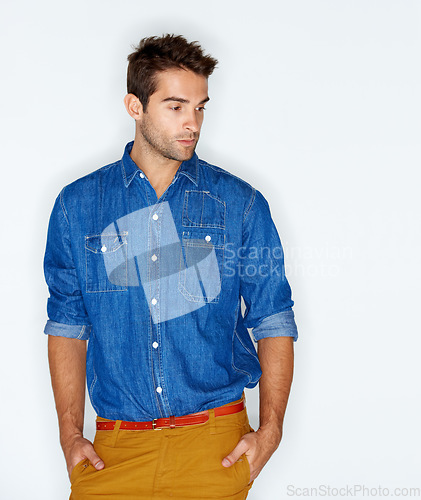 Image of Thinking, stylish and a man with clothes for fashion, trendy and denim on a white background. Young, cool and a person or model with an idea, shirt or hipster clothing on a backdrop for style