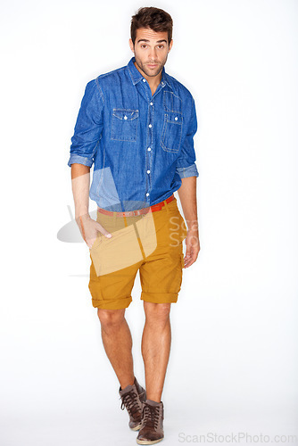 Image of Stylish, portrait and a man or model with fashion, unique style or clothes on a white background. Cool, walking and handsome guy or person in hipster, elegant and funky clothing on a backdrop