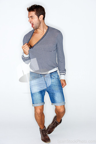 Image of Sexy, crazy and a man with fashion clothes on a white background with confidence. Shouting, young and a person, model or guy looking cool, stylish or trendy in clothing, shorts or hipster style