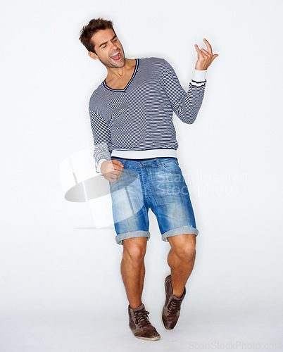Image of Portrait, rock and a man with air guitar for music, creative or acting as a musician. Cool, fun and a guy, person or artist playing an instrument with imagination for a concert on a white background