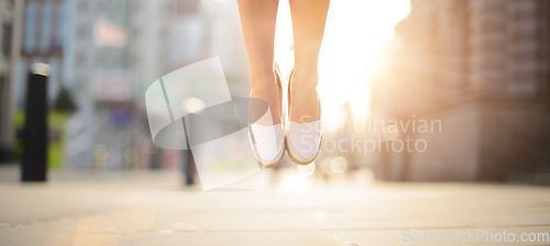 Image of Make the most of every moment. a woman jumping mid air in happiness.