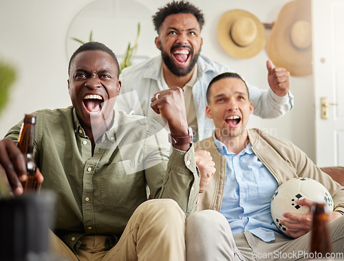 Image of Were on the winning team. three male friends looking cheerful while drinking beers and sitting together.