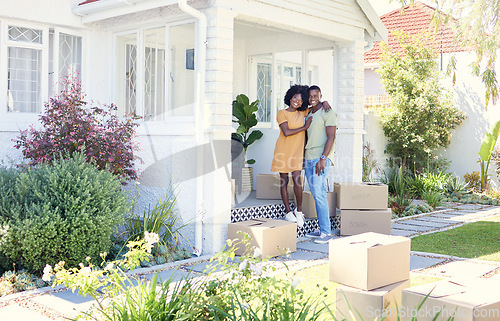 Image of Unlocked a new chapter. a young couple moving into their new house.